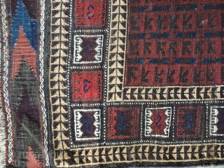 Small Antique Baluch rug, probably late 19thC. Good condition with original kilim ends. selvages replaced. Good condition with lower pile in center. Unusual border design. Nice saturated colors including a brilliant blue  ...
