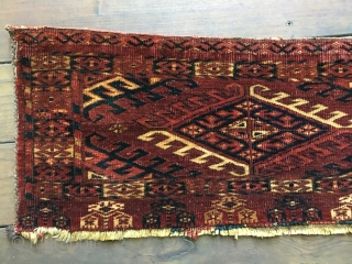 Antique Turkmen Yomud Torba with all natural dyes and in excellent condition.
Field consists of dyrnak guls. Side cords original and top fold over complete. Size: 52" X 13"/132 X 33cm. Unusual skirt  ...