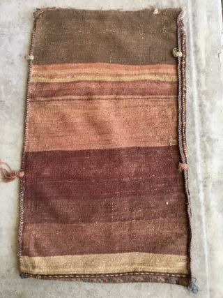 Antique Baluch grain or wall bag, late 19th century. Gorgeous natural colors including a stunning light blue. Complete original bag in full glossy pile with top closures and colorful kilim back. Measures  ...
