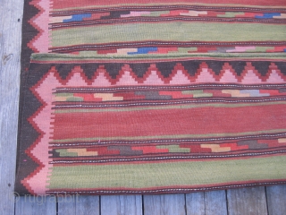 Kurdish kilim, early 20th C. Bright saturated natural colors, especially a vibrant light green. Very good condition. 7'10" X 4'5" (239 X 135 cm). Washed.        
