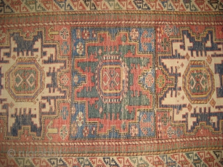 Lesghi Star rug circa 1870s. partially worn yet restorable. Clear saturated natural colors combined with a crisp design. An especially beautiful green in central medallion. 4'8" X 3'. Clean and ready for  ...