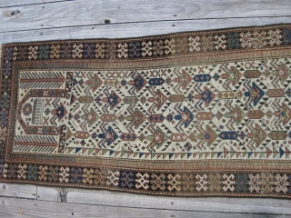 Late 19th C. Shirvan Prayer Rug. Well drawn with classic stylized shrubs and tribal symbols. All natural colors including nice blues and greens. Low to Medium pile. 67 X 29in./170 X 74cm.  ...