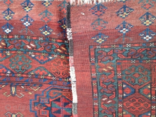 Ersari chuval from second half of the 19th C. Good colors including yellow,three blues and a blue/green. Center gul contains purple silk. Fine weave with a KPSI of 200. Medium pile lower  ...