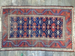 Iconic Mina Khani Baluch, ca 3rd Qtr 19thC. All organic saturated colors including light and dark blues. Prominent "Turkman Line" border design. Size: 58X36in./147X91cm. Areas of oxidation and wear. Buyer pays shipping.  ...