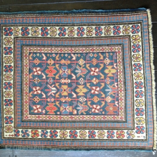 Small squarish Kuba rug, circa 1900. Good colors and nice Chichi field design.
Size 39" X 32"/100 X 86cm. Mostly original selvages and ends stabilized. Washed.
Shipping included within the U.S. 

   