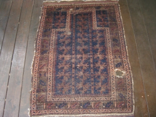 Baluch Timuri prayer rug, ca 19th C. Almost square format. Contains that great blue for which this type is well known. Some overall wear with a 4" hole on the right border.  ...