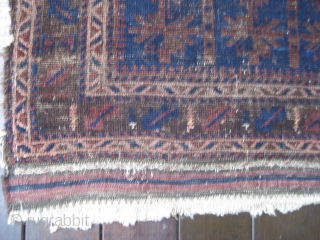 Baluch Timuri prayer rug, ca 19th C. Almost square format. Contains that great blue for which this type is well known. Some overall wear with a 4" hole on the right border.  ...