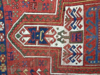 Small Antique Sewan Kazak rug, probably late 19th C. Bright saturated natural colors including nice lemon yellow and a generous use of green. Condition: even wear with some knots showing. No repairs  ...