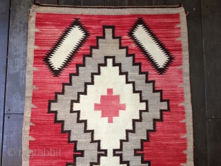 Navajo rug from the 1920s. Complete and in very good condition with only some sight fraying on corners. Good colors and there is no bleeding. Size 36X64"
91X163cm. Clean and ready for the  ...