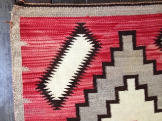 Navajo rug from the 1920s. Complete and in very good condition with only some sight fraying on corners. Good colors and there is no bleeding. Size 36X64"
91X163cm. Clean and ready for the  ...