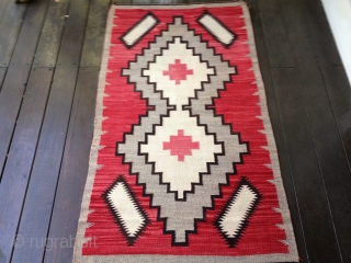 Navajo rug from the 1920s. Complete and in very good condition with only some sight fraying on corners. Good colors and there is no bleeding. Size 36X64"
91X163cm. Clean and ready for the  ...