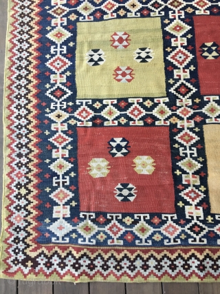 Striking Qashqui Kilim rug from the late 19thC. or early 20thC. All good saturated colors including aubergine. Size: 7ft. 9in. X 5ft. Good condition but with some worn areas as shown in  ...