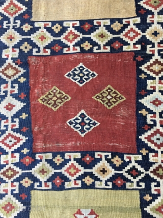 Striking Qashqui Kilim rug from the late 19thC. or early 20thC. All good saturated colors including aubergine. Size: 7ft. 9in. X 5ft. Good condition but with some worn areas as shown in  ...