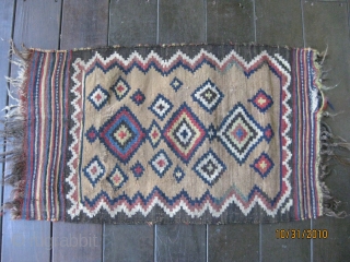 Small antique Luri kilim. All natural dyes. Excellent colors including camel field. Good condition except for some minor fraying on kilim ends. 32 X 20 in.
Clean. Great piece for the wall or  ...