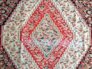 Antique classic Sennah kilim. Great colors and design. Complete and in good condition except for small areas of wear and some fabric splits. Size 76X50in/193X127cm.        
