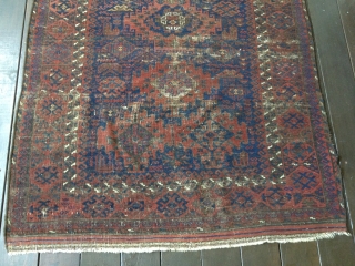 19th C. Baluch Main Carpet, 79"X48"/201X122cm. All natural dyes. Dark palette. Thin, soft floppy handle. Very evenly worn but still makes a statement with a good variety of design symbols. Retains part  ...