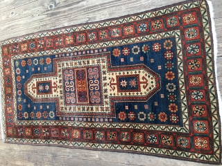 Antique Sewan Kazak Rug. Early 20th Century, 1910-1920. Lovely all organic colors including a natural orange and nice greens and blues. Original side cords and ends. Size 88"X 45"/223 X 114cm. Good  ...