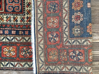 Antique Sewan Kazak Rug. Early 20th Century, 1910-1920. Lovely all organic colors including a natural orange and nice greens and blues. Original side cords and ends. Size 88"X 45"/223 X 114cm. Good  ...