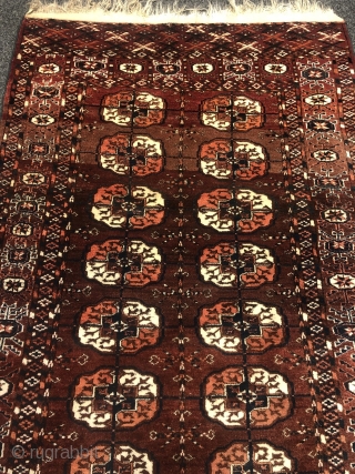 A lovely small antique Turkmen Tekke rug with 2 rows of Guls, Age: 19th century. Size: 170x105cm / 5'6''ft x 3'5''ft. All natural colors, good overall condition, little old moth damage at  ...