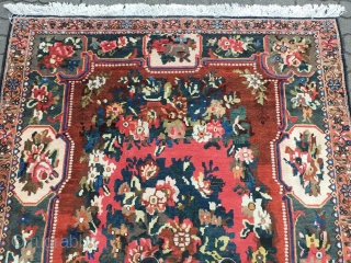 Fine antique Persian Bakhtiary rug with a classical flower or so called Golfarang design, good condition, size: ca. 235x165cm / 7'7''ft x 5'4''ft , age: circa 1920.
      