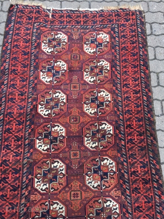 A Baluch interpretation of a Turkmen Tekke pattern: antique Baluch rug, size: ca 197cm x 102cm / 6'5''ft x 3'4''ft             