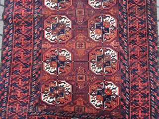 A Baluch interpretation of a Turkmen Tekke pattern: antique Baluch rug, size: ca 197cm x 102cm / 6'5''ft x 3'4''ft             