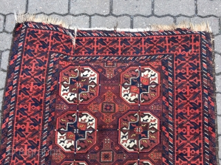 A Baluch interpretation of a Turkmen Tekke pattern: antique Baluch rug, size: ca 197cm x 102cm / 6'5''ft x 3'4''ft             