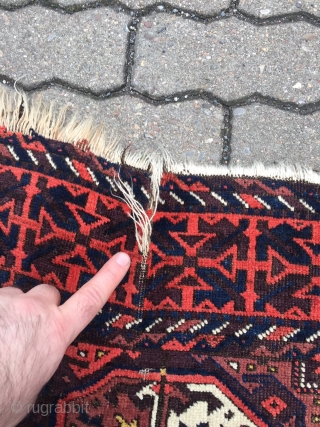 A Baluch interpretation of a Turkmen Tekke pattern: antique Baluch rug, size: ca 197cm x 102cm / 6'5''ft x 3'4''ft             