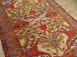 a very beautiful Gerus Bidjar rug with great colors and archaic drawing. Age: circa 1870. Size:ca.170x130cm / 5'6''x4'3''ft www.najib.de

Like us on Facebook: Najib Gallery         