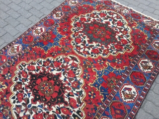 Colorful Persian Bakhtiary rug with lots of flowers and birds, age: circa 1920, size: ca. 205x150cm / 6'7''ft x 5ft             