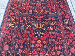 Antique Persian Bakhtiary tribal rug displaying a tree of life design with lot of animals, wool foundation. Age: late 19th century, size: ca. 370x210cm / 12'1''ft x 6'8''ft good condition
   