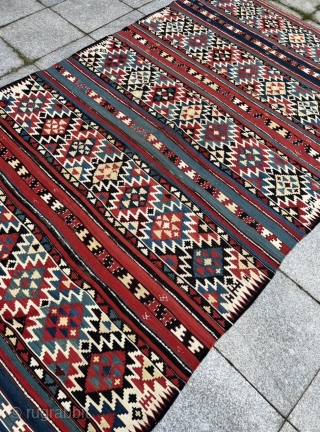 A colorful antique Caucasian Shirvan kilim from the 19th century, size: ca. 305x160cm / 10ft by 5‘3ft a few tiny old moth holes, otherwise good condition.       