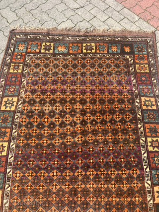 Antique Kordi rug from Khorassan province of Northeast Persia, good condition with full chunky pile. Glossy, shiny wool.  Its intricate design features a mesmerizing interplay of earthy brown tones, evoking a  ...