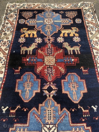 Look at the lions and giraffes in this playful and lovely antique Persian Bakhtiary tribal rug, size: 195x120cm / 6'4''ft x 4ft           