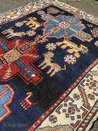 Look at the lions and giraffes in this playful and lovely antique Persian Bakhtiary tribal rug, size: 195x120cm / 6'4''ft x 4ft           