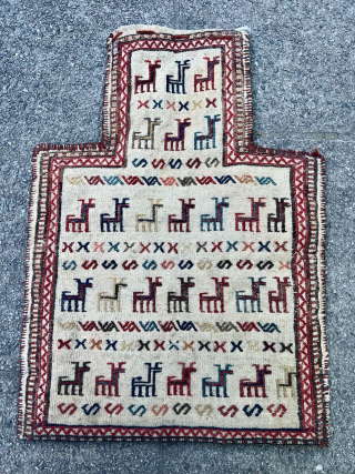 A beautiful Antique Kordi saltbag or so called Namakdan from Northeast Persia displaying animal caravans on one side. Woven in Soumakh technique. A Namakdan is a container to store and carry salt.  ...