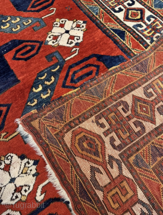 A Caucasian masterpiece: Impressive antique Pinwheel Kazak or so called Swastika Kazak from the mid-19th. Very well balanced geometric design and deep natural dyes. Good overall condition with original sides and ends.  ...