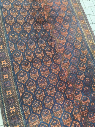 This unusual large antique Baluch rug from West - Afghanistan was woven in two parts. It has long kilim ends. Good overall condition. Size: ca. 280cm x 135cm / 9'2''ft x 4'4''ft  ...