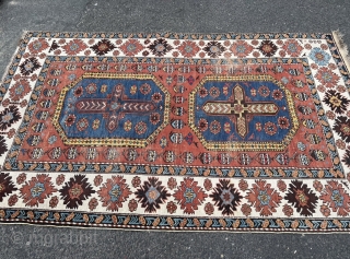 A very nice antique Caucasian Shirvan rug with lots of little Swastikas and birds, size: ca. 215x135cm / 7ft by 4‘4ft some localized wear         
