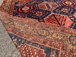 Antique Persian Bakhtiary rug with garden design. The indigo blue field is surrounded by a beautiful camel ground border. Size: circa 197x163cm / 6’5ft by 5’3ft http://www.najib.de      