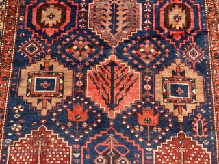 Antique Persian Bakhtiary rug with garden design. The indigo blue field is surrounded by a beautiful camel ground border. Size: circa 197x163cm / 6’5ft by 5’3ft http://www.najib.de      