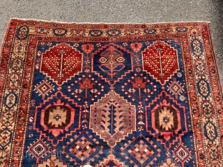 Antique Persian Bakhtiary rug with garden design. The indigo blue field is surrounded by a beautiful camel ground border. Size: circa 197x163cm / 6’5ft by 5’3ft http://www.najib.de      