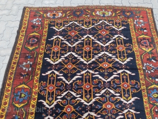 Antique Persian Bakhtiary village rug from the 19th century, wool foundation, beautiful natural colors. size: 405x190cm / 13'3''ft x 6'3''ft             