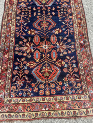 An exceptionally characterful and rare antique Bakhtiari tribal runner featuring an all-wool structure and a deep midnight-indigo field. Unlike urban Bakhtiari workshop productions, this piece displays all the hallmarks of authentic tribal ...