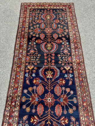 An exceptionally characterful and rare antique Bakhtiari tribal runner featuring an all-wool structure and a deep midnight-indigo field. Unlike urban Bakhtiari workshop productions, this piece displays all the hallmarks of authentic tribal ...