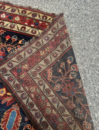 An exceptionally characterful and rare antique Bakhtiari tribal runner featuring an all-wool structure and a deep midnight-indigo field. Unlike urban Bakhtiari workshop productions, this piece displays all the hallmarks of authentic tribal ...