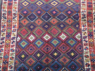 Antique Kurdish Saujbulagh tribal rug with fantastic colors and shiny wool. Circa 1870. Size: ca. 260x140cm / 8'5'' x 4'6''ft The design of this village weaving displays interlocking stepped diamonds that completely  ...