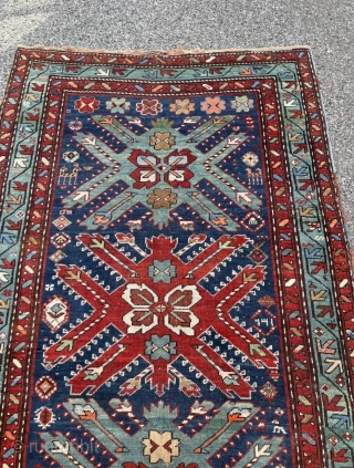 Antique Caucasian Karabagh rug. The design is inspired by Tshelaberd or so called Eagle / Adler Kazak rugs. Size: 228x116cm / 7‘5ft by 3‘8ft         