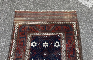 Antique Mina Khani Baluch rug from an old German estate. Beautiful large flatwoven kilim ends. Age: 19th century. Some corrosion of black. Size: 195x105cm / 6‘4ft by 3‘4ft     