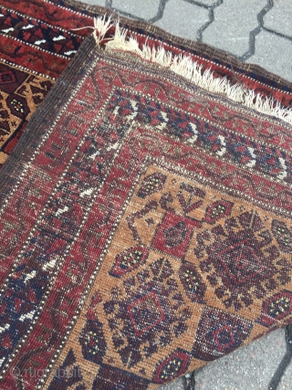 A very nice antique camel ground Baluch rug with saturated colors, shiny wool and a very well executed hooked design. The size is circa 170x90cm / 5'6''ft x 3ft    